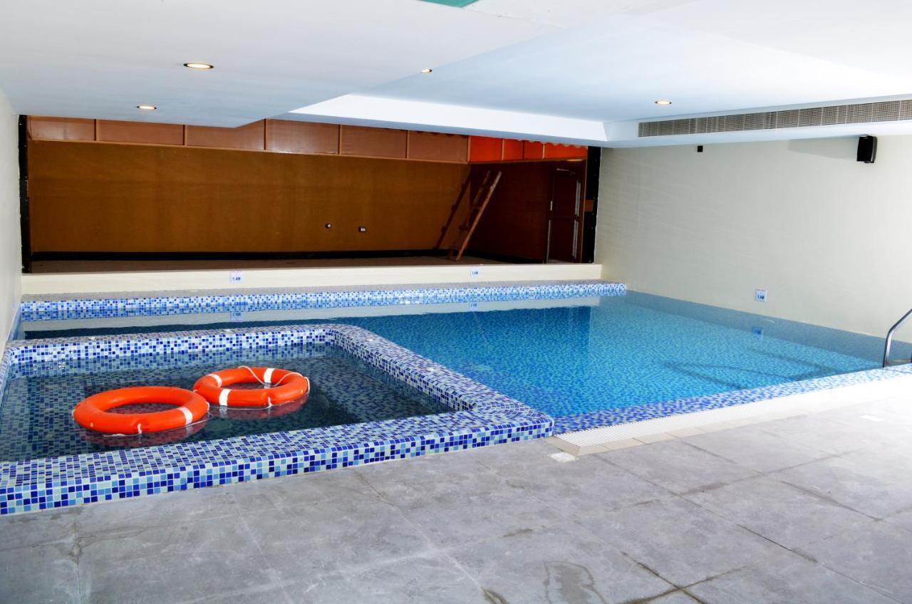 Nooh Tower Apartment Al Hidd Bagian luar foto