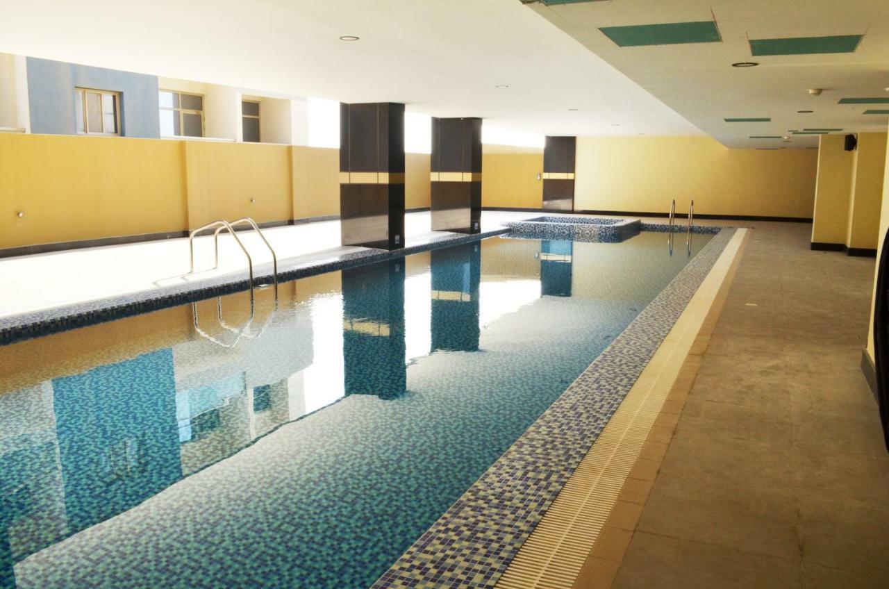 Nooh Tower Apartment Al Hidd Bagian luar foto