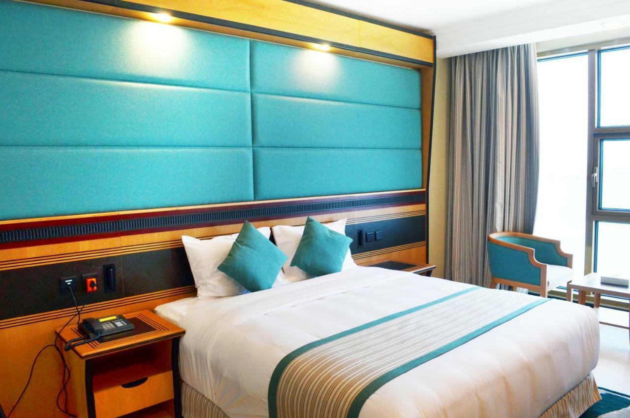 Nooh Tower Apartment Al Hidd Bagian luar foto